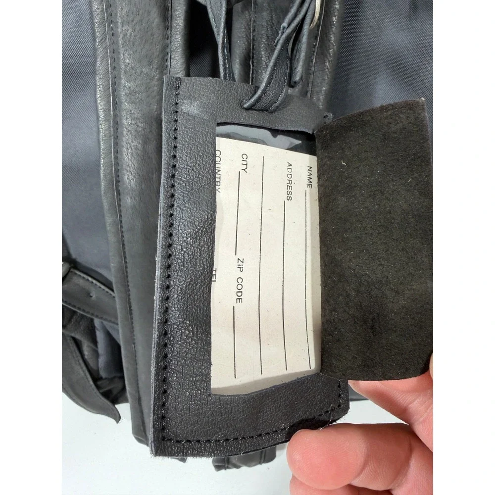 New United Motor Manufacturing Black Leather Backpack Multi Pocket YKK Zipper